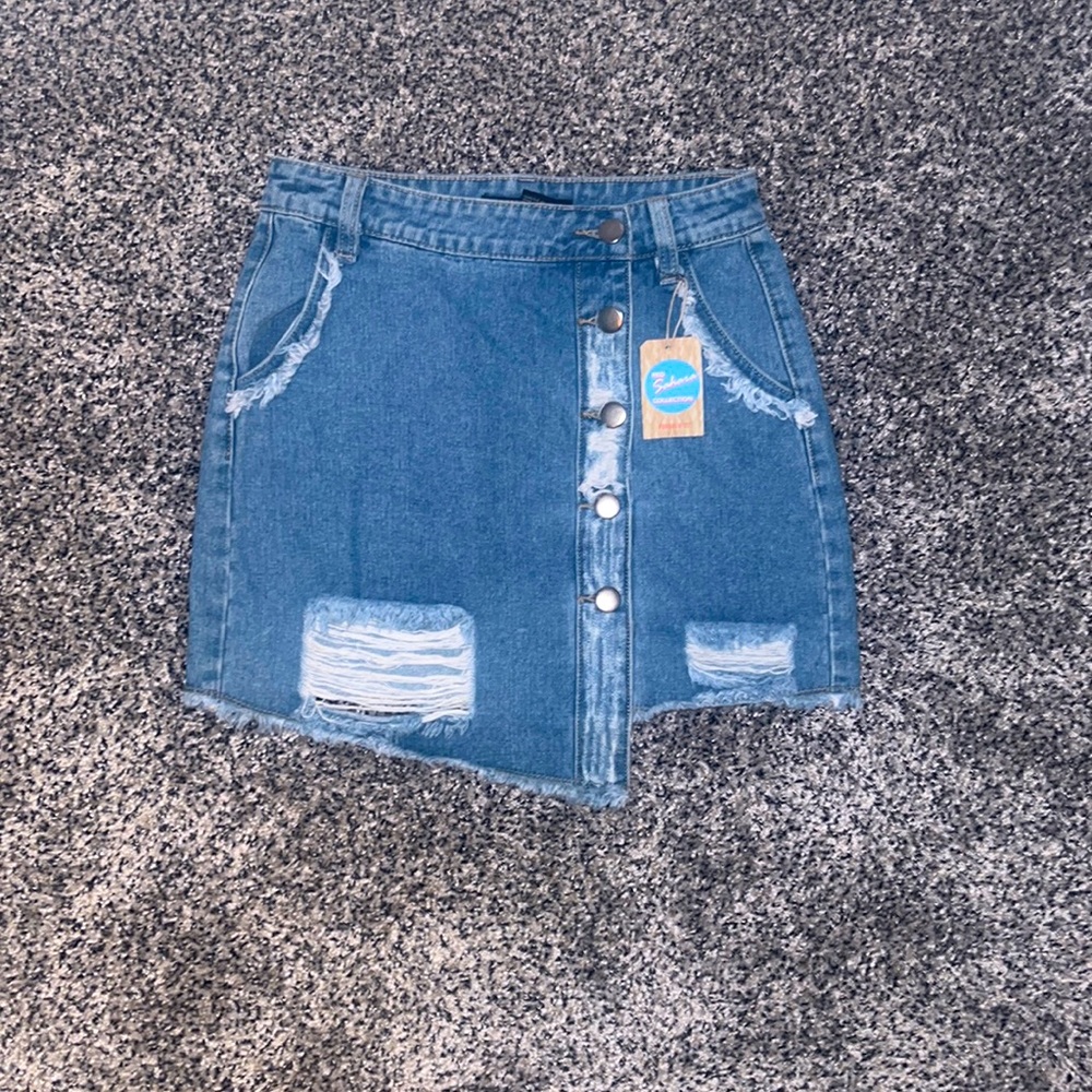 Forever 21 asymmetrical ripped denim skirt. Never been worn.